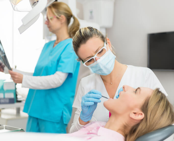 woman receiving a dental exam