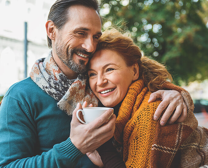 happy couple drinking coffee together